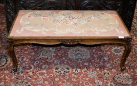 An Early/Mid 20th Century Duet Stool With petit point embroidered cushion seat.