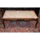 An Early/Mid 20th Century Duet Stool With petit point embroidered cushion seat.