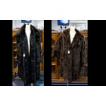 A Vintage Mink Coat Full length black fur coat with black floral satin jacquard lining,