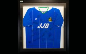 Football Interest Framed And Glazed Wigan Athletic Signed Football Shirt.