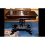A 19th Century Rosewood Centre Table Rectangular top on carved acanthus and fluted column.