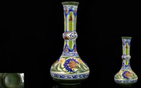 An Early 20th Century Globular Vase The Whole Decorated in Iznik pattern in green and blue on cream