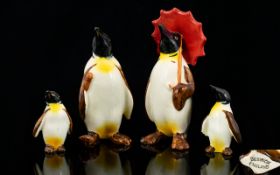Beswick - Early 4 Piece Set of The Penguin Family.