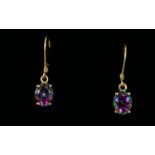 Northern Lights Mystic Topaz Pair of Drop Earrings, oval cut solitaires of the pinkish purple to