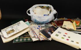 A Large Quantity Of Stock Stamps A mixed collection to include various half-filled albums and loose