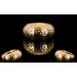 A 9ct Gold Contemporary Ring Planished gold dress ring in modern domed style,