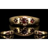9ct Gold Three Stone Ruby Set Dress Ring fully Hallmarked for G375. Ring size O. Please see photo.