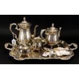 A Plated Coffee And Tea Service Comprising twin handle etched tray with accompanying teapot,