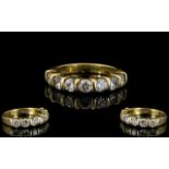 18ct Yellow Gold Diamond Set Half Eternity Ring of Attractive Form. Fully Hallmarked for 750 - 18ct.