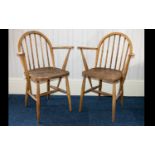 Ercol A Pair Of 1970's Elm/Ash Windsor Armchairs Each in good condition, impressed marks to back '