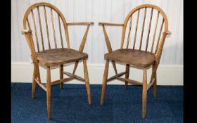 Ercol A Pair Of 1970's Elm/Ash Windsor Armchairs Each in good condition, impressed marks to back '