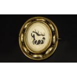 Equestrian Interest A Victorian Ivory And Yellow Metal Brooch Of circular form with pin back