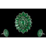 Emerald Marquise Shape Cluster Ring, a raised central marquise cut .5ct emerald, framed with round