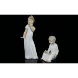 Nao by Lladro Pair of Porcelain Figures - Depict Young Boy and Girl In Nightdresses,