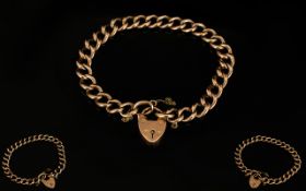 9ct Gold - Early Curb Bracelet with Attached 9ct Heart Shaped Padlock.