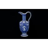 German Mettlach Style Blue And White Ewer The whole with foliate decoration.