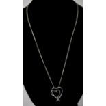 A Modern Platinum Set Diamond Heart Shaped Pendant, Attached to Platinum Chain. Marked 950.