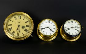 Three Brass Ships Clocks To include Schatz 'Royal Mariner' brass and wall mounted clock with white