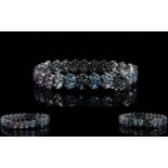 Shades of Blue Topaz and Purple Amethyst Bracelet, a 14.5ct line of clusters in the formation of Sky