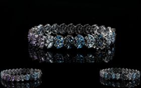 Shades of Blue Topaz and Purple Amethyst Bracelet, a 14.5ct line of clusters in the formation of Sky