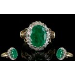 Ladies 9ct Gold Emerald and Diamond Cluster Ring, The Large Central Emerald of Good Colour.