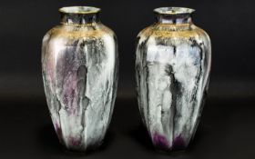 Keeling and Co Ltd Burslam Losol Ware A pair of drip glazed lustre vases, finished with gilt trim.