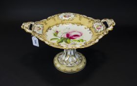 A 19th Century Hand Painted Comport Coalport style Deutsche Blumen design with pierced twin handles