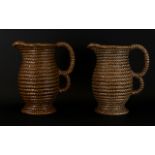 A Pair Of Govancroft Rope Design Two Handled Pitchers Height Ten Inches.