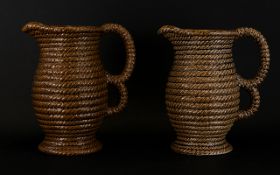 A Pair Of Govancroft Rope Design Two Handled Pitchers Height Ten Inches.