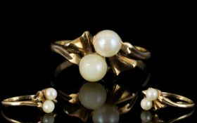 Ladies Attractive Pearl Set 9ct Gold Dress Ring, The Two Pearls Set In a Bow Tie Design.