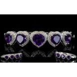 Amethyst Heart Cut Hinged Bangle, five heart cut deep purple amethysts graduating from the central