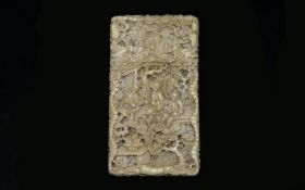 Chinese Early 19th Century Carved Ivory Card Case Profusely carved throughout, depicting figures,