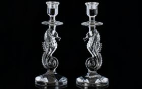 Waterford Crystal A Pair Of Seahorse Candlesticks - Two candlesticks comprising circular bases,