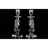 Waterford Crystal A Pair Of Seahorse Candlesticks - Two candlesticks comprising circular bases,