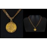 A Modern 9ct Gold Curb Chain with Attached Bermuda Gold Medal. Fully Hallmarked, Please See Photo.