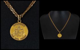 A Modern 9ct Gold Curb Chain with Attached Bermuda Gold Medal. Fully Hallmarked, Please See Photo.