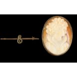 A 9ct Gold Mounted Shell Cameo Brooch Depicting a glamour girl, facing right,