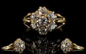 Antique 18ct Gold And Diamond Cluster Ring Set with seven old round cut diamonds in a flowerhead