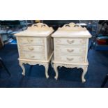 A Pair of Cream Painted Bedside Cabinets.