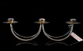 A Danish Silver Plated Candleabrum By Berg Marked to underside, comprising three circular bobeche/