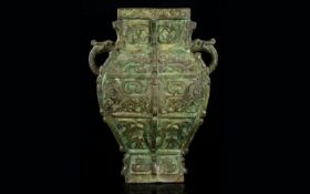 A Late 19th Century Bronze Archaic Style Vase Antique twin handle sectional vase with organic/