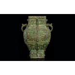 A Late 19th Century Bronze Archaic Style Vase Antique twin handle sectional vase with organic/