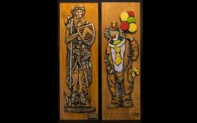 A Pair Of Embossed Figurative Wooden Panels the first in the form of a medieval knight,