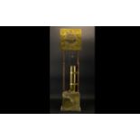 A Brass Water Gravity Clock Circa 1969 Of typical form with square brass dial,