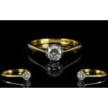 18ct Gold and Platinum Single Stone Diamond Ring - The round brilliant cut Diamond of excellent