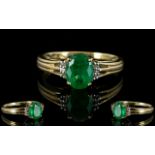 A 9ct Yellow Gold And Emerald Ring Wonderful oval cut solitaire ring,