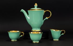 Stavangerflint Norwegian Part Tea Set Four pieces with gilt interiors and eau de nil ground.