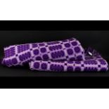 Welsh Tapestry Blankets in attractive purple and grey woven squares design.