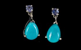 Sleeping Beauty Turquoise and Tanzanite Drop Earrings, a combination of two rare stones,