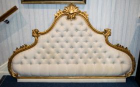 A 20thC Italian Gesso Framed Headboard with Baroque style scrolling shell frame and cream button